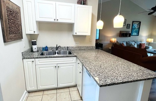 Central Myrtle Beach Condo | Endless Summer Cozy Condo at Magnolia Place - Golf Course Views!