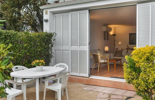 Platja d'Aro Apartment | Enjoy a Comfortable and Relaxing Stay in This Bright Apartment with Private Garden