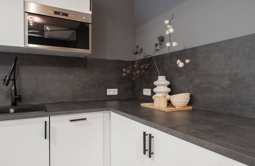 Oss House | Enjoy a stylish stay in our 12-bedroom property each with a private shower and fridge