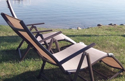 Williamsburg Cottage | Enjoy our Skegemog Lakefront Cottage/w dock & Boat Hoist on Elk-Torch Chain
