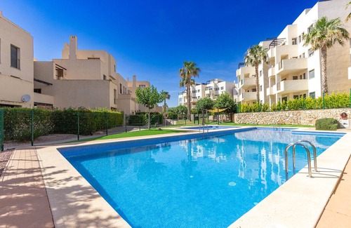 Corvera Apartment | Enjoy peace and relaxation at this golf country club with communal pool.