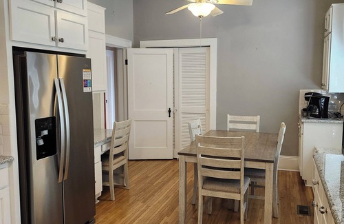 Mount Airy House | Enjoy small-town, Main Street from the front porch of this historic bungalow!