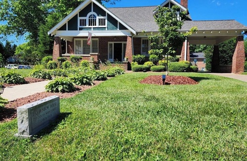 Mount Airy House | Enjoy small-town, Main Street from the front porch of this historic bungalow!