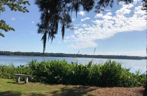 Cordesville House | Enjoy the sunrise on private dock on lake Haskie