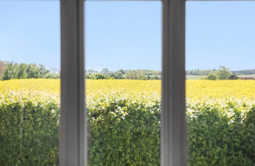 Korsor House | Enjoy the tranquillity of nature in this vacation home, nestled in an idyllic landscape.