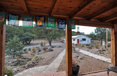 Tyrone Apartment | Enjoy Wildlife from Your Rocking Chair and Swinging Bench on Front Porch