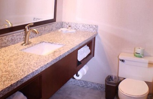 Cody House | Enjoy Your Own Private Cabin! Outdoor Pool, FREE Parking and Airport Shuttle!