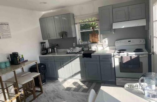 Garden City Park Villa | Entire 3bdr home w/parking, backyard, FirePit, BBQ