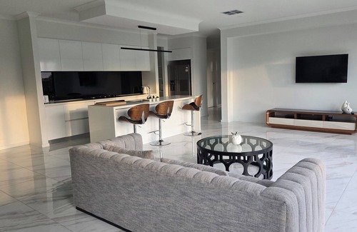 Manor Lakes House | Entire house creekfront with theatre & spa