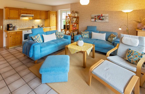 Dornum Apartment | Erdgeschoßwohnung Friesenperle mit Terrasse und Garten
