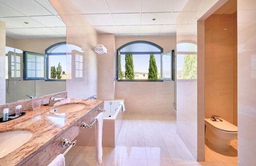 Cebreros Hotel | Escape to a Spacious Room Surrounded by Beautiful Gardens