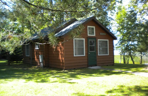 Squaw Lake Cabin | Escape to cozy, secluded lakefront cabin in the north woods