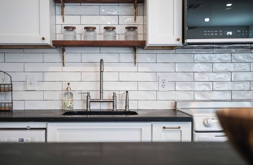 Windsor Park House | Euro-inspired 1-br cottage with AC, w/d, private fenced yard in central Austin