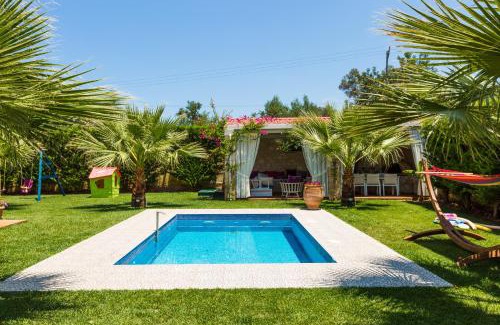 Roumeli Villa | Eva & Dimitrios Villas, Captivating Oasis with Pools & BBQ, By ThinkVilla