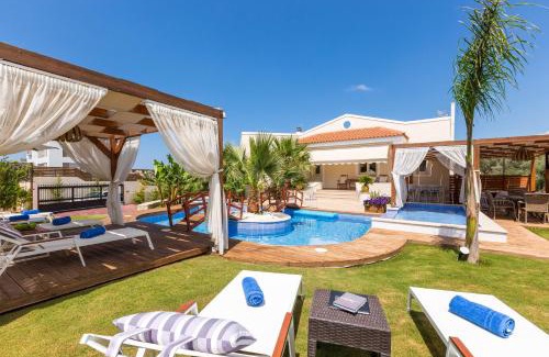 Roumeli Villa | Eva & Dimitrios Villas, Captivating Oasis with Pools & BBQ, By ThinkVilla