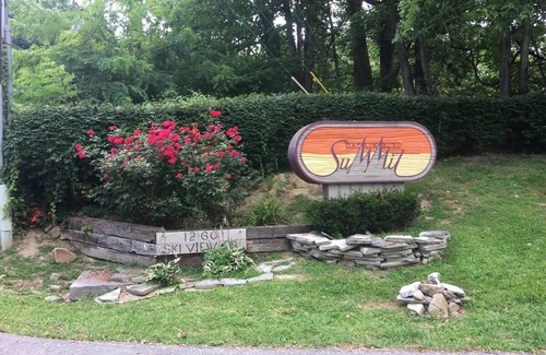 Chalet Village Condo | Everyone Welcome! Private WiFi, Heated Pool, Gas Grills, Catch the View!