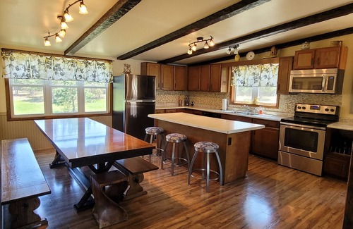 Gordon House | Exclusive Retreat! Private Lake, River Frontage and 100's of Acres with Trails