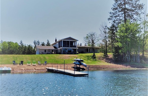 Gordon House | Exclusive Retreat! Private Lake, River Frontage and 100's of Acres with Trails