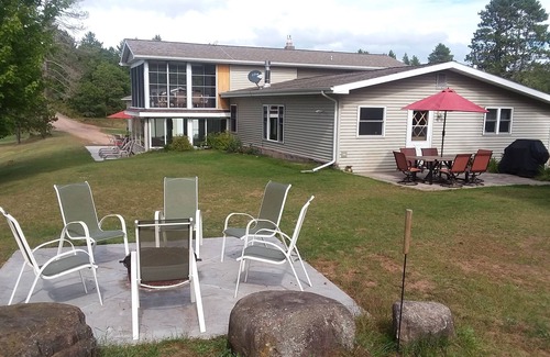 Gordon House | Exclusive Retreat! Private Lake, River Frontage and 100's of Acres with Trails