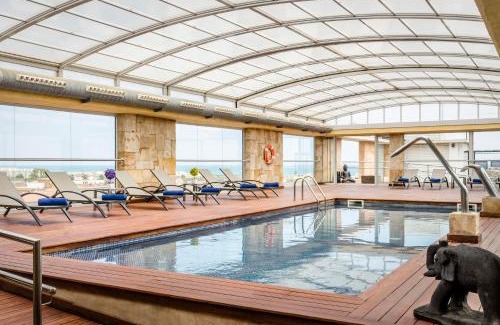 Cunit Hotel | Exe Cunit Suites & Spa