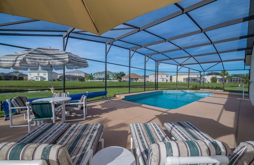 Crescent Lakes Villa | Executive 4 bed 3 bath villa, lake view, large pool with spa 30 mins from Disney