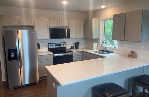 Atchison Apartment | Executive Penthouse Apartment the perfect place to call home!