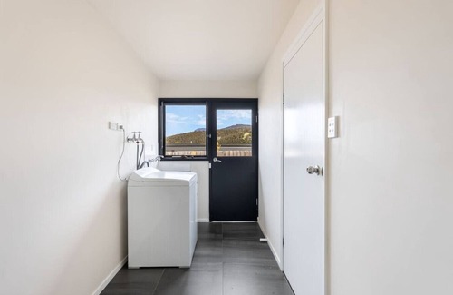 Claremont Apartment | Expansive River-View Oasis