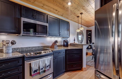 Mirror Lake House | Expansive screened deck, Gas fireplace, Gorgeous views, Firepit