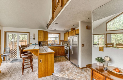 Mount Hood Village Ski Chalet | Expansive Wooded Home with a Brook, Firepit, Private Hot Tub and Shared Pool