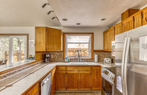 Mount Hood Village Ski Chalet | Expansive Wooded Home with a Brook, Firepit, Private Hot Tub and Shared Pool