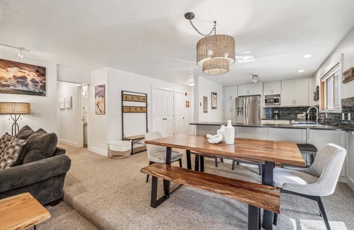 Four O'Clock Condo | Experience comfort at Sundowner II 201, featuring a cozy fireplace and easy ski access!