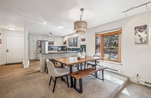 Four O'Clock Condo | Experience comfort at Sundowner II 201, featuring a cozy fireplace and easy ski access!