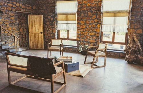 Nashik Cottage | Experience remote stone cottage part of farm stay by the lake amidst raw nature.
