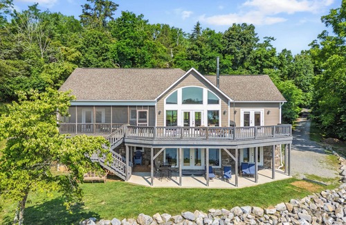 Pulaski House | Experience the perfect blend of rustic charm and modern luxury in this Claytor lakefront retreat