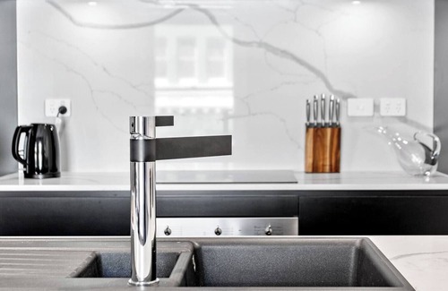 Hobart Central Business District Apartment | Explore the Quaint Cafe Locale from Saddlers House