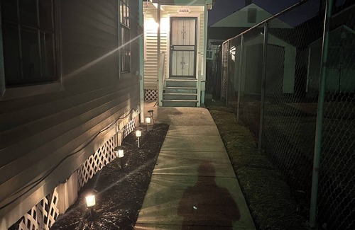 Central City Cottage | Extended Stay near Downtown, Hospitals and Coworking Spaces.