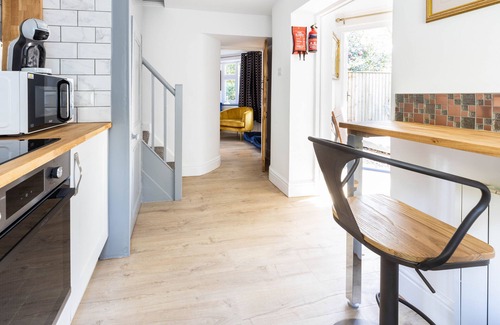 Illogan Cottage | Fairytale Thatched 18th Century Cornish Cottage with Hot Tub & Stunning Gardens