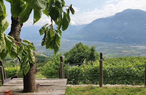 Kurtatsch an der Weinstraße House | Family apartment with playground and terrace surrounded by vineyards
