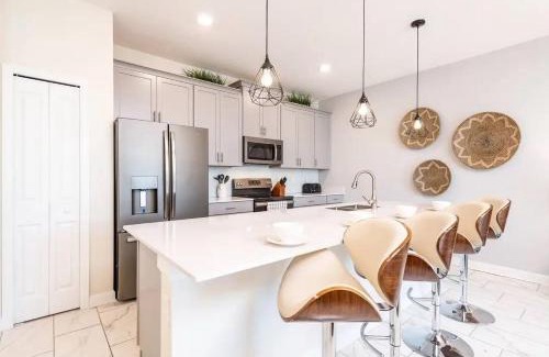 Four Corners Apartment | Family Friendly 4BR Retreat with Heated Pool Access near Disney World