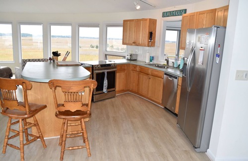 Broadkill Beach House | Family friendly home w/ 360 views of the bay and wild life preserve (sleeps 12)
