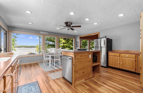 Wautoma Cottage | Family Friendly Lake Home with level lot & Large game Rm, Dog friendly!