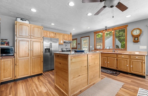 Wautoma Cottage | Family Friendly Lake Home with level lot & Large game Rm, Dog friendly!