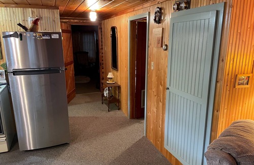 Rapid City Cottage | Family FUN: Torch Lake Cottage with Private Beach Access - Kayaks & SUP Provided