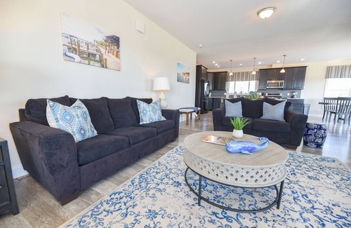 Long Neck House | Family fun - waterfront, beach, pools, pet friendly!