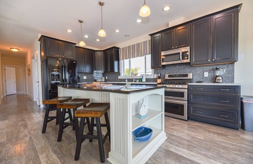 Long Neck House | Family fun - waterfront, beach, pools, pet friendly!