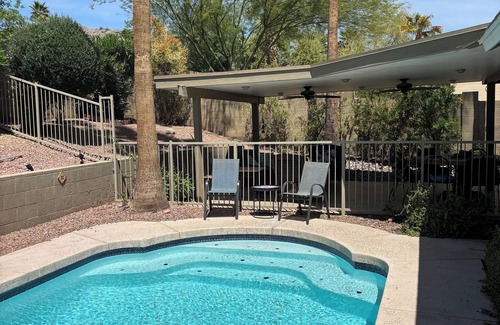 Desert Foothills Estates House | Family oasis with heated pool, desert landscaping and South Mountain views.