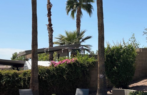 Desert Foothills Estates House | Family oasis with heated pool, desert landscaping and South Mountain views.