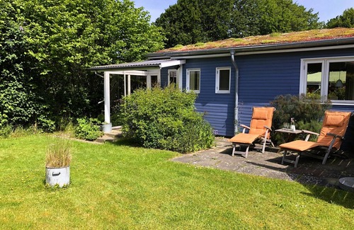Langballigholz House | Favorite place by the sea - the Blaue Pause vacation home with fireplace and garden.