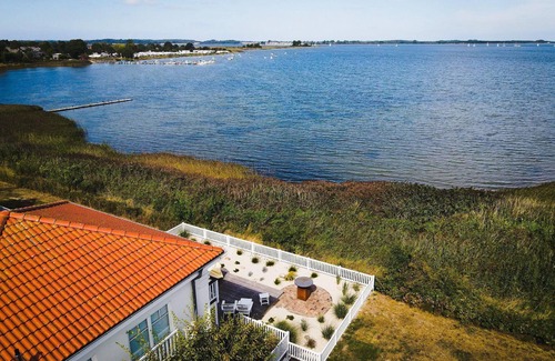 Olpenitz House | Ferienhaus Sliminde by Seeblick Ferien, direkte Wasserlage,E-Ladesäule,Sauna