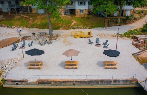 Lake Ozark Cabin | Fire pit, dock, ramp, full kitchen, water toys